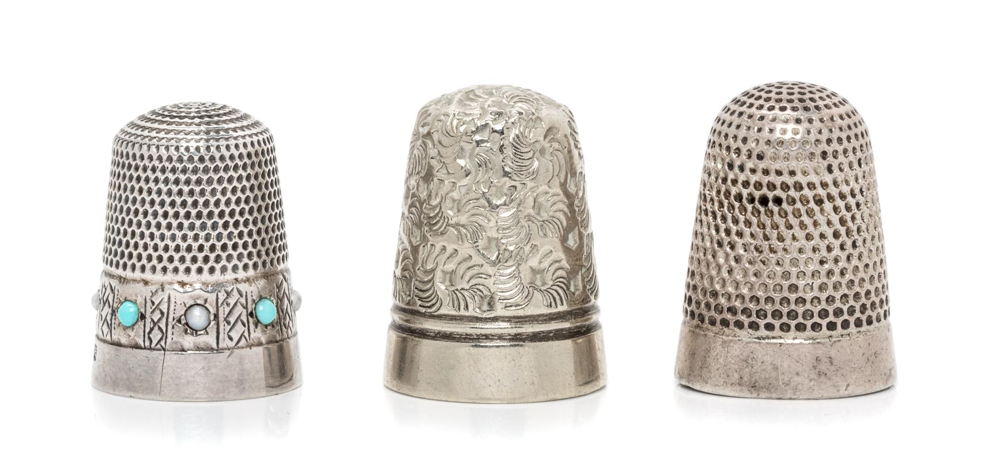 A Group of Three English Silver Thimbles, Various Makers, comprising a Victorian example having a knurled top and body, Henry Griffith