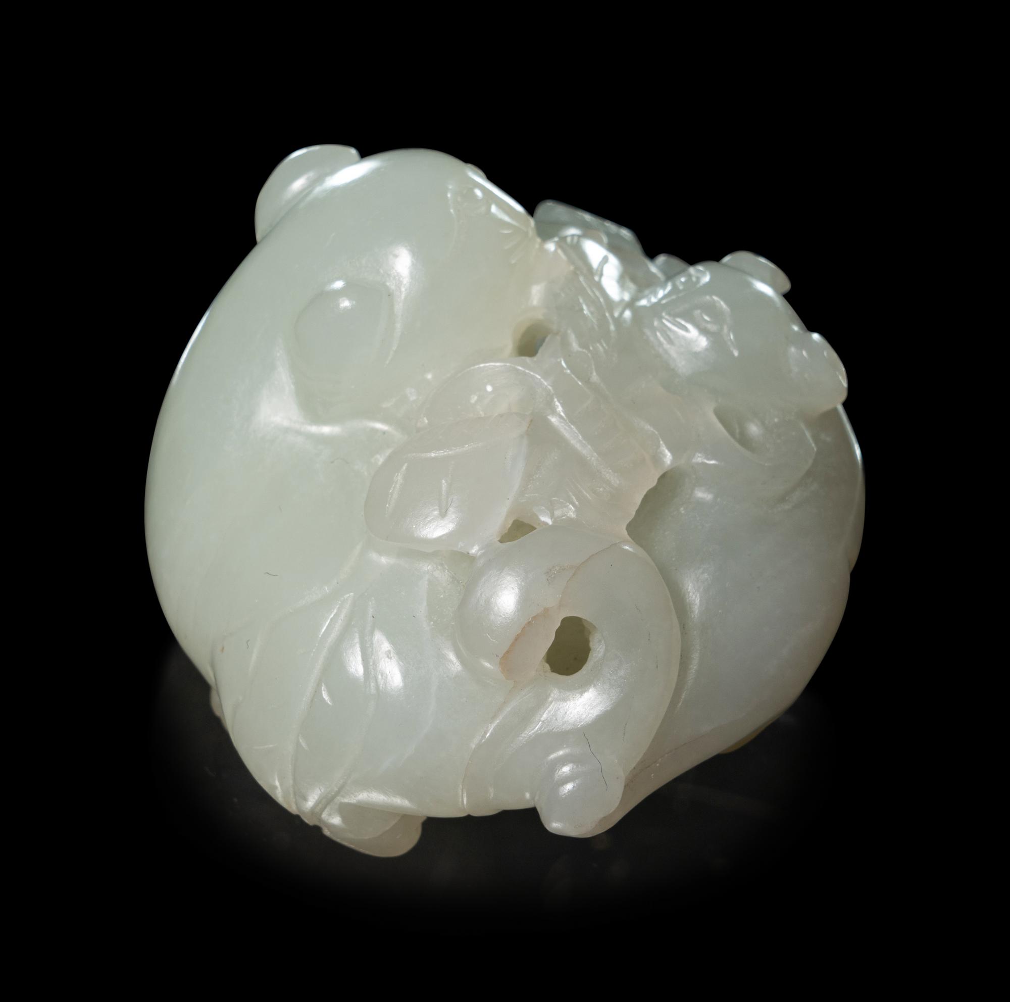 A Carved White Jade 'Double Badgers' Group