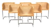 Harvey Probber (American 1922-2203), Fabricius and Kastholm, 1960s, wicker bucket chairs, having a cantilever chrome tubular frame