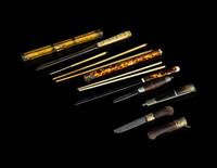 A Collection of Four Chopsticks and Knife Sets
