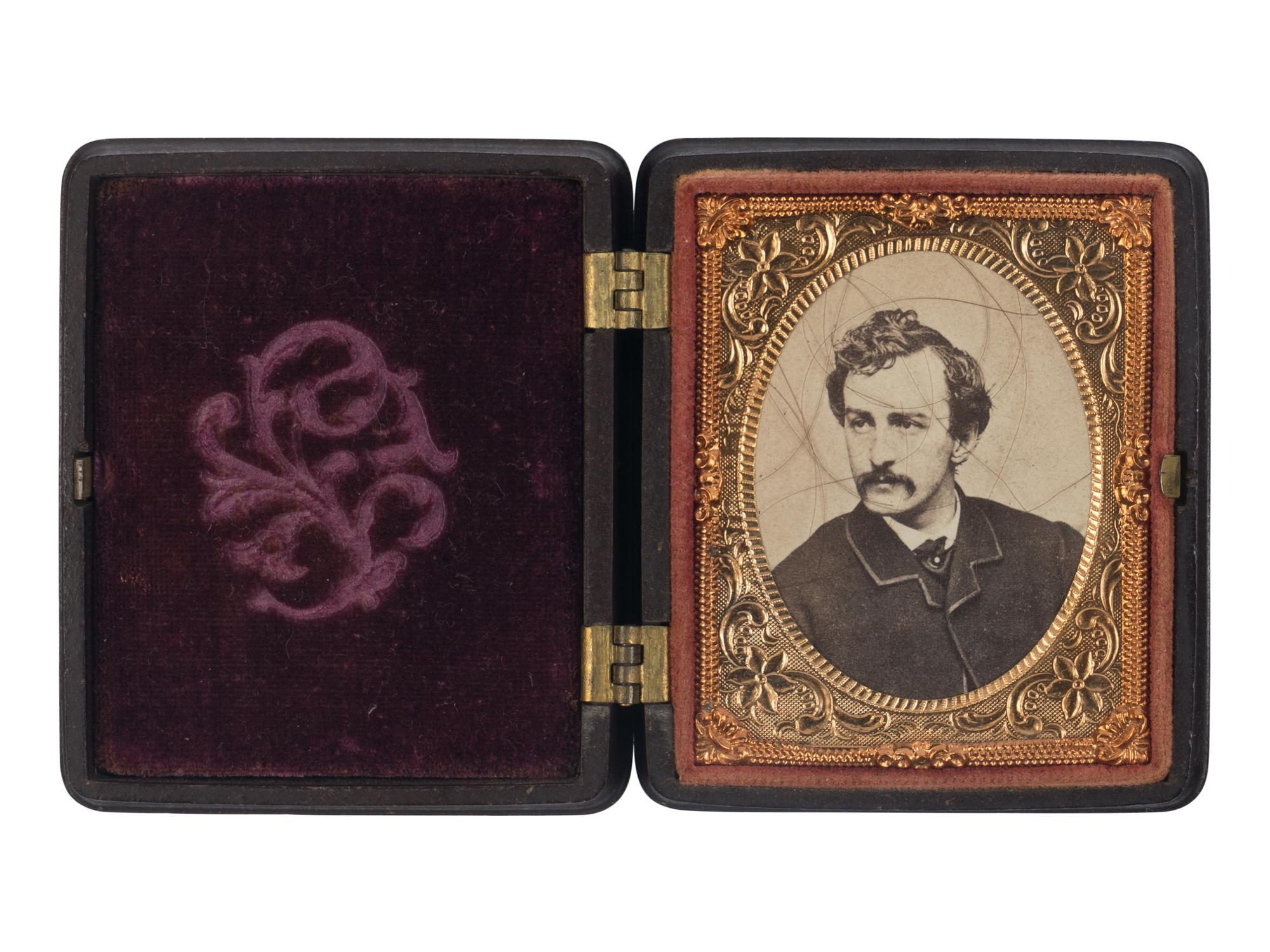 BOOTH, John Wilkes (1838-1865). Several strands of hair purportedly clipped from Booth's head at Garrett's Farm, 26 April 1865.