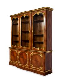 A Louis XV Style Gilt Bronze Mounted Kingwood Breakfront Cabinet