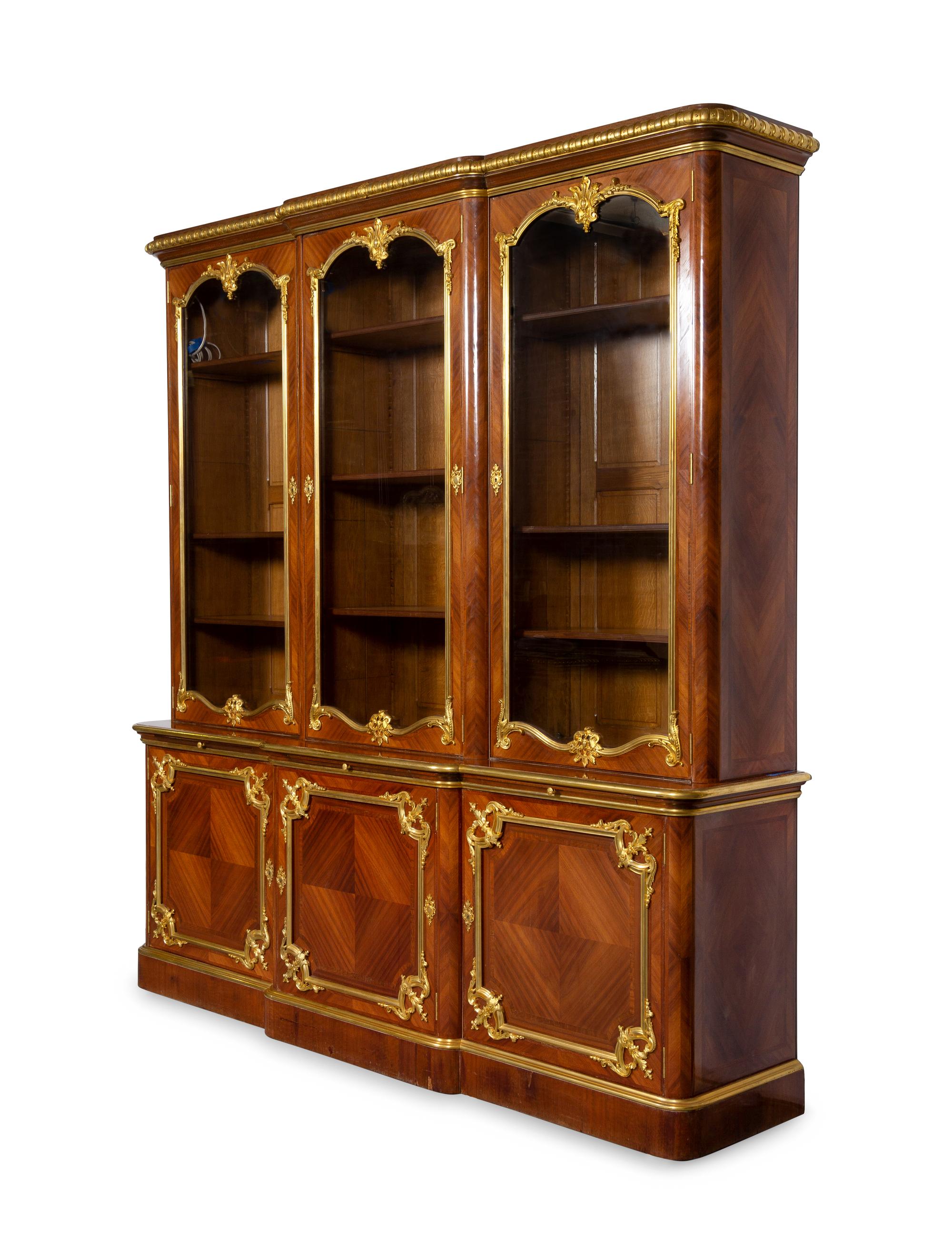 A Louis XV Style Gilt Bronze Mounted Kingwood Breakfront Cabinet