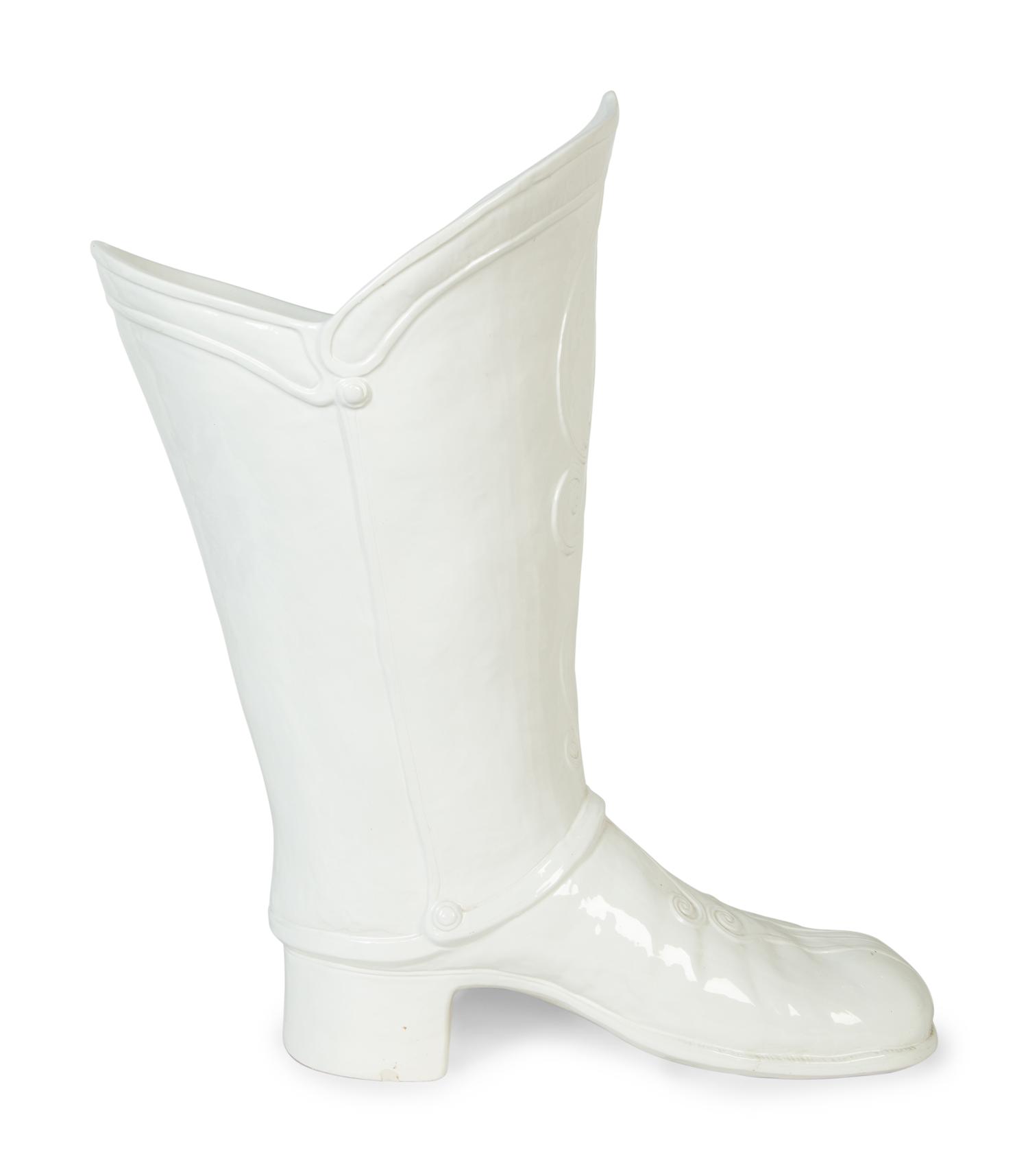 An Italian White-Glazed Earthenware Boot