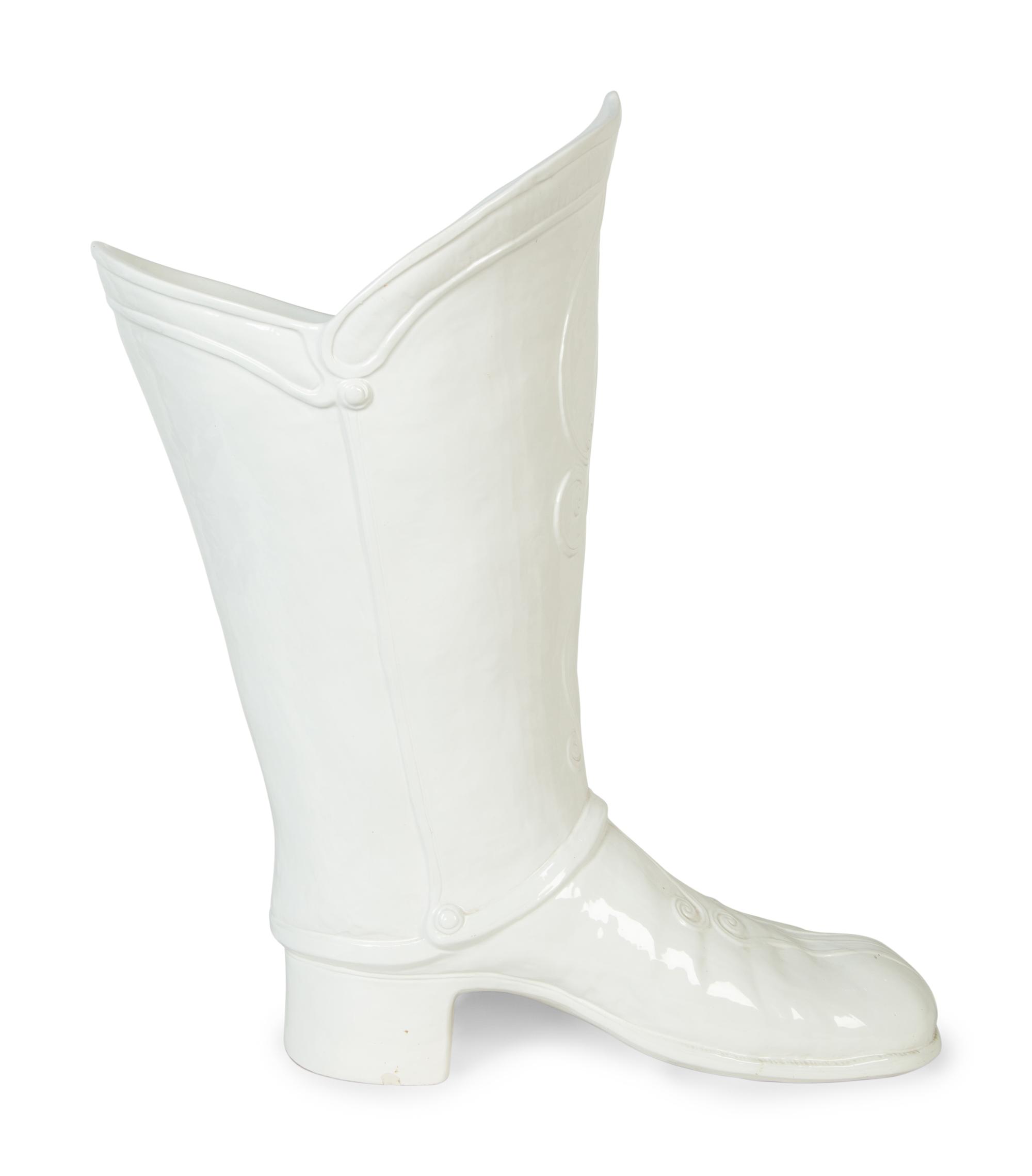 An Italian White-Glazed Earthenware Boot