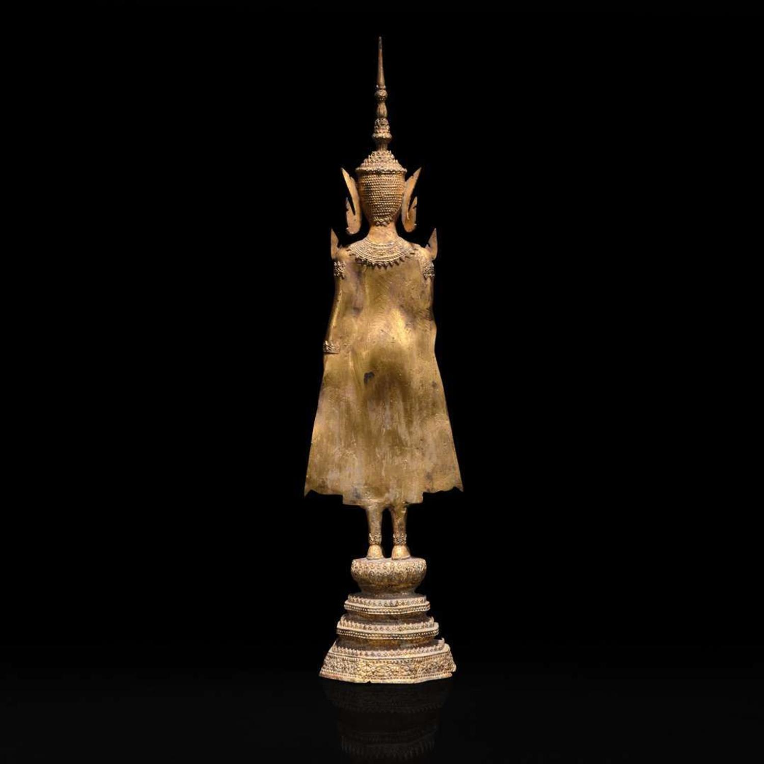 A Thai gilt lacquered bronze standing Buddha 泰国漆金佛造像立像