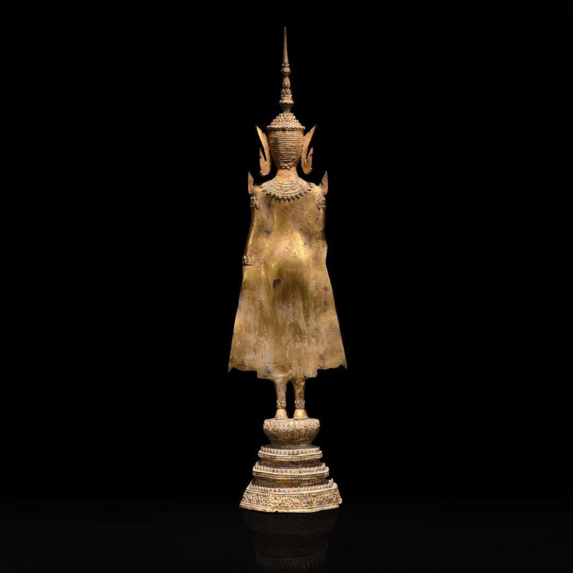 A Thai gilt lacquered bronze standing Buddha 泰国漆金佛造像立像