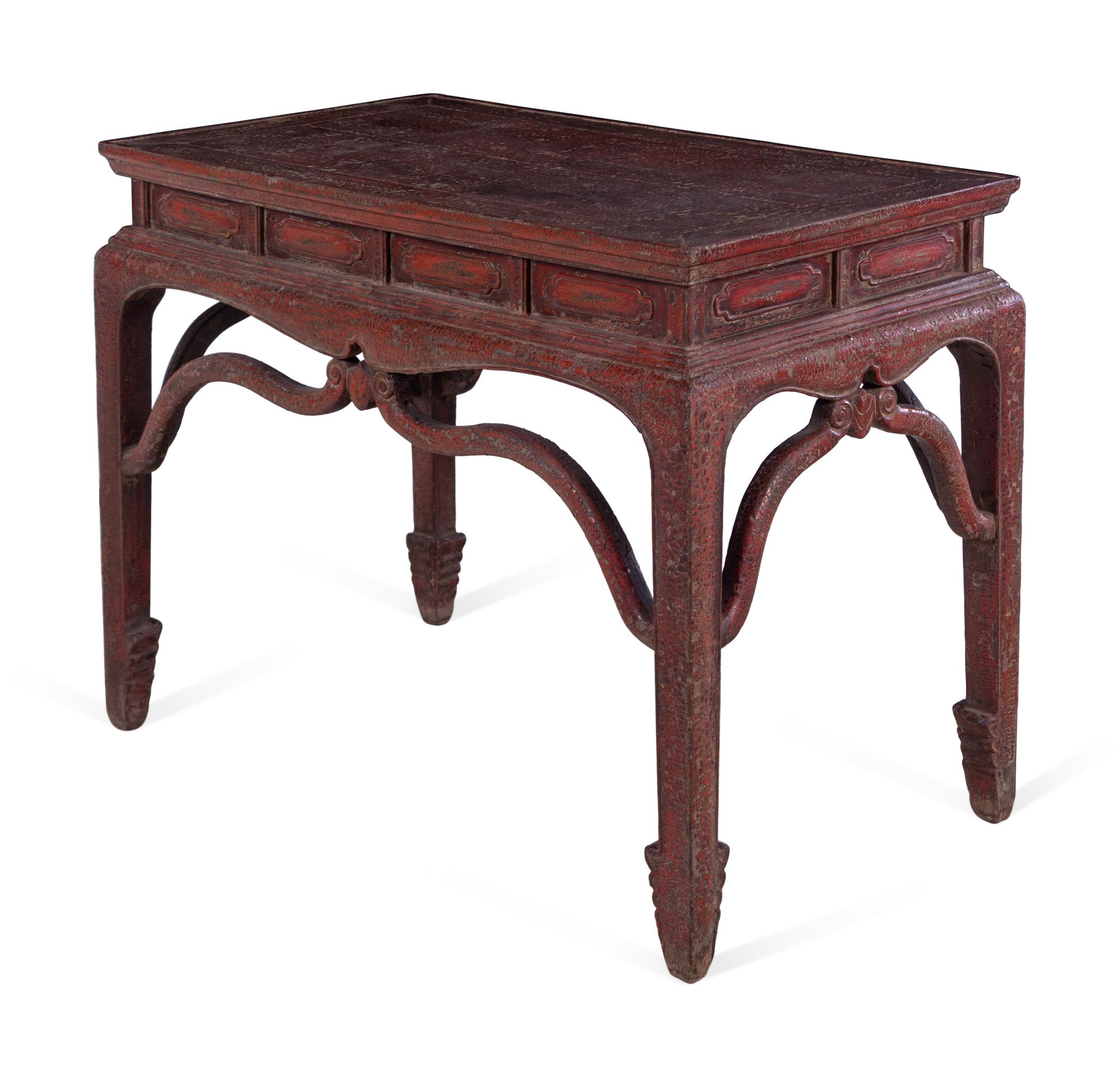 A Chinese Carved and Red Painted Writing Table
