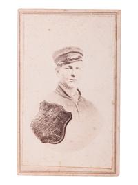 SHELL, J.H., photographer. CDV portrait of Private Horace C. Green, 2nd New York Cavalry, "Harris Light Cavalry," with superimposed ID shield. Findlay, OH: [ca 1860s].