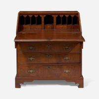 A Queen Anne walnut-banded and pine slant-front desk circa 1740
