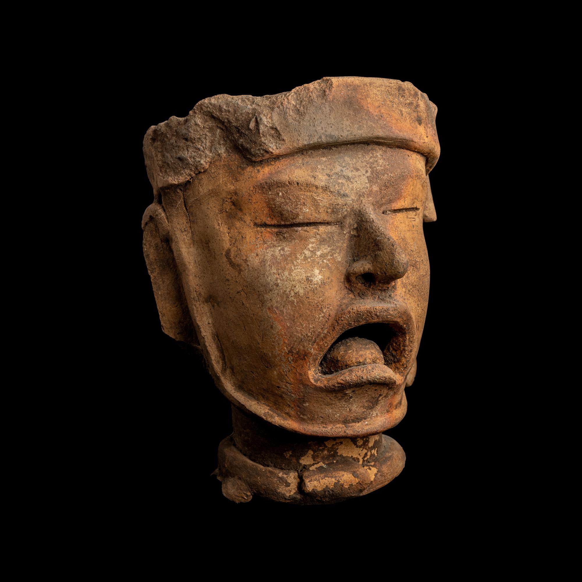 A Vercruz Terracotta Head of Xipe Totec