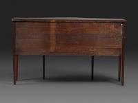 A Federal Fan-Inlaid and Figured Mahogany Serpentine Sideboard