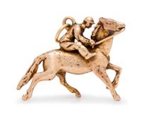 A Yellow Gold Horse and Jockey Charm,