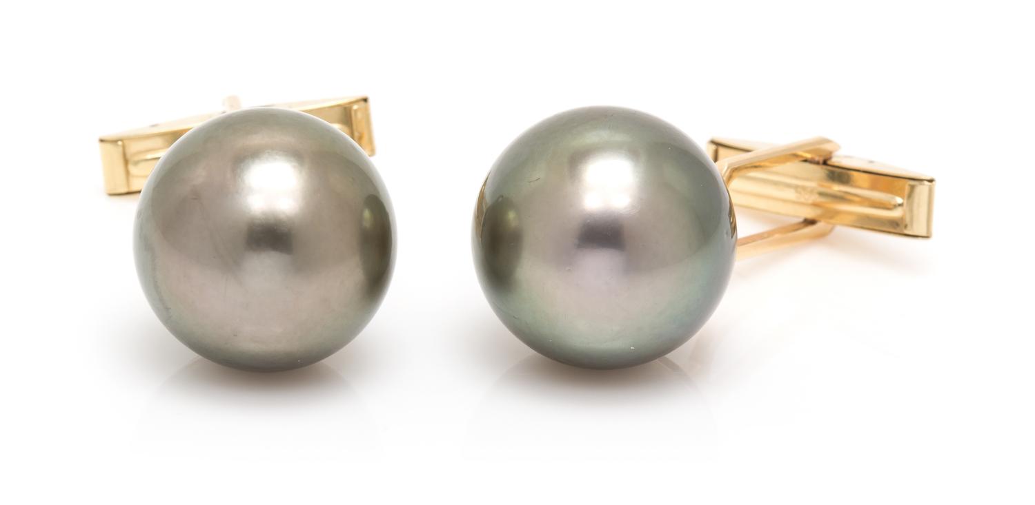 A Pair of 14 Karat Yellow Gold and Cultured Tahitian Pearl Cufflinks, 10.20 dwts.