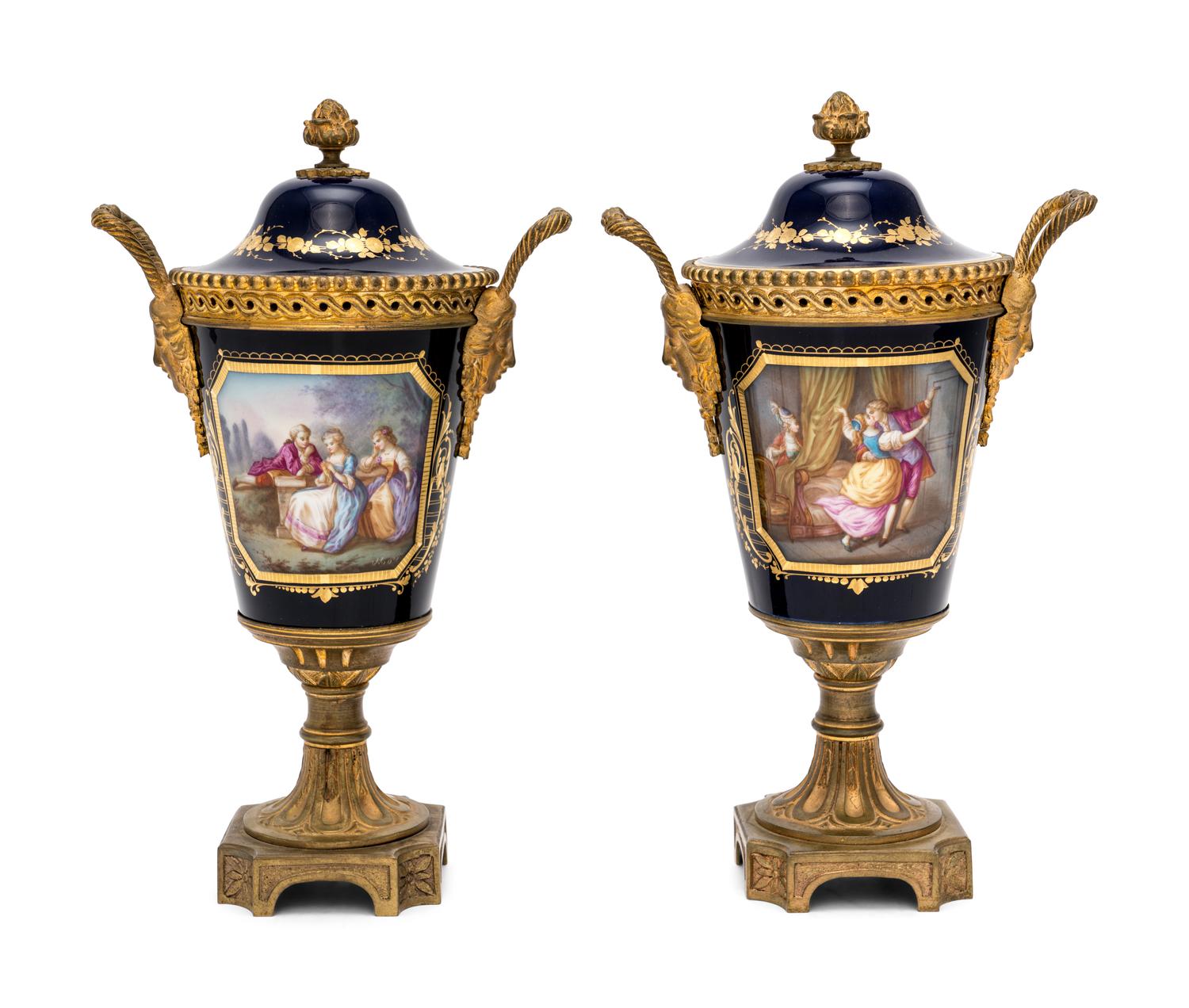 A Pair of Sèvres Style Gilt Bronze-Mounted Porcelain Urns