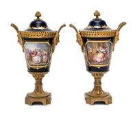 A Pair of Sèvres Style Gilt Bronze-Mounted Porcelain Urns