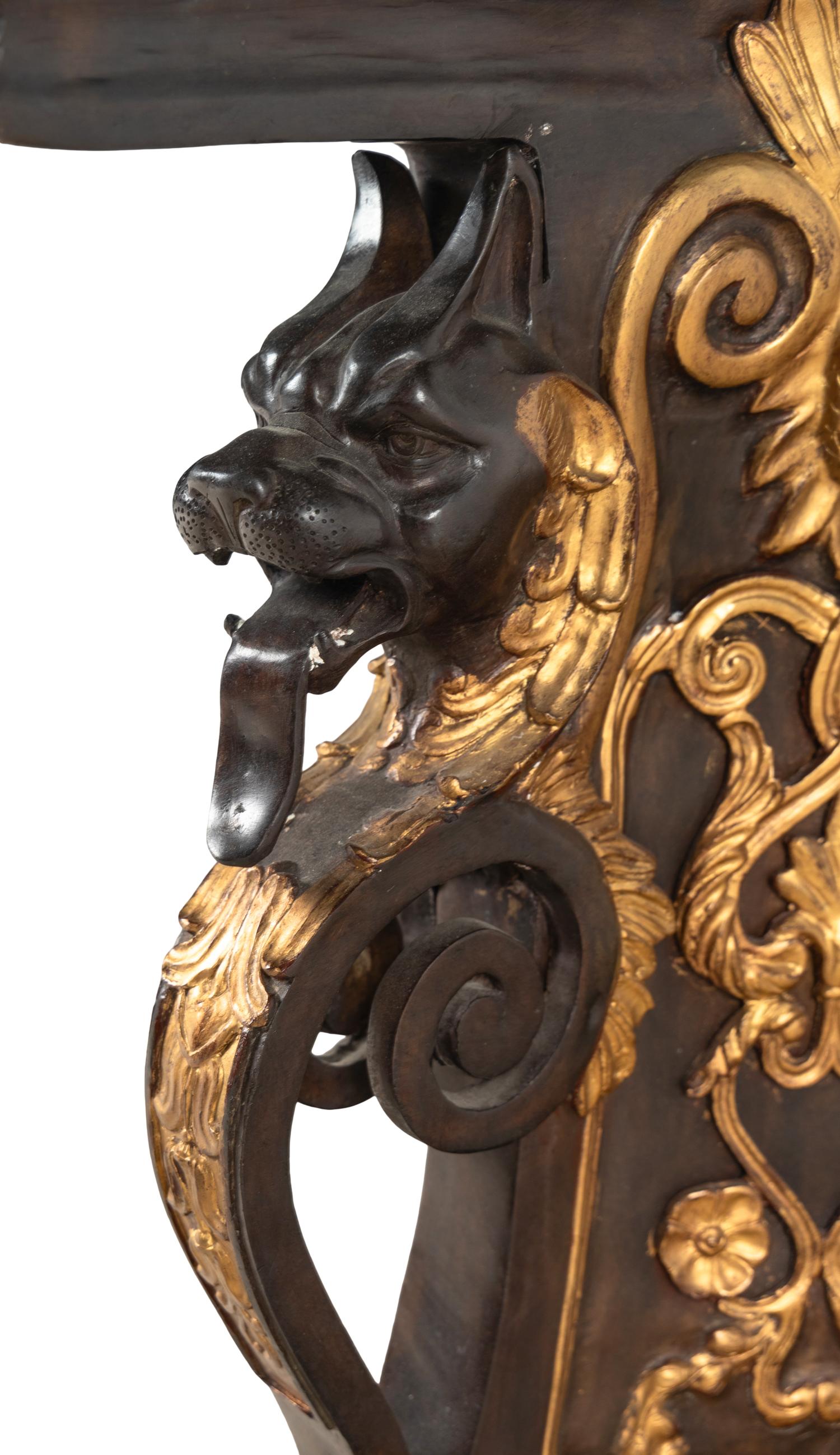 A Renaissance Style Parcel Gilt Bronze Glass-Top Center Table