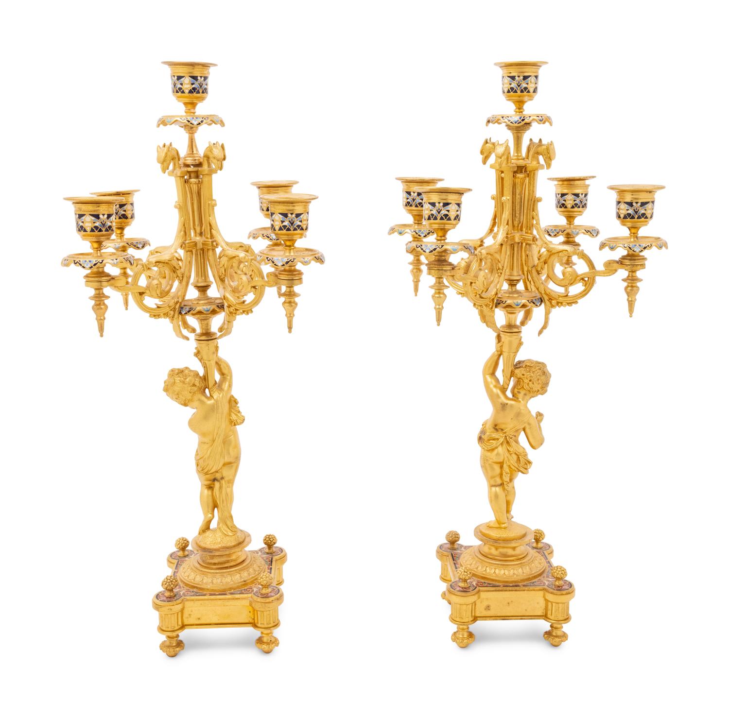 A Pair of French Gilt Bronze and Champlevé Five-Light Candelabra
