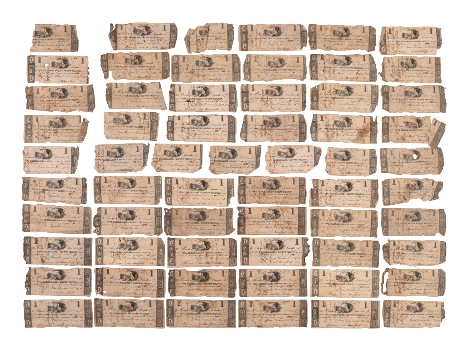 [CURRENCY]. More than 100 notes from the Owl Creek Bank of Mount Vernon, Ohio. Ca 1816-1818.