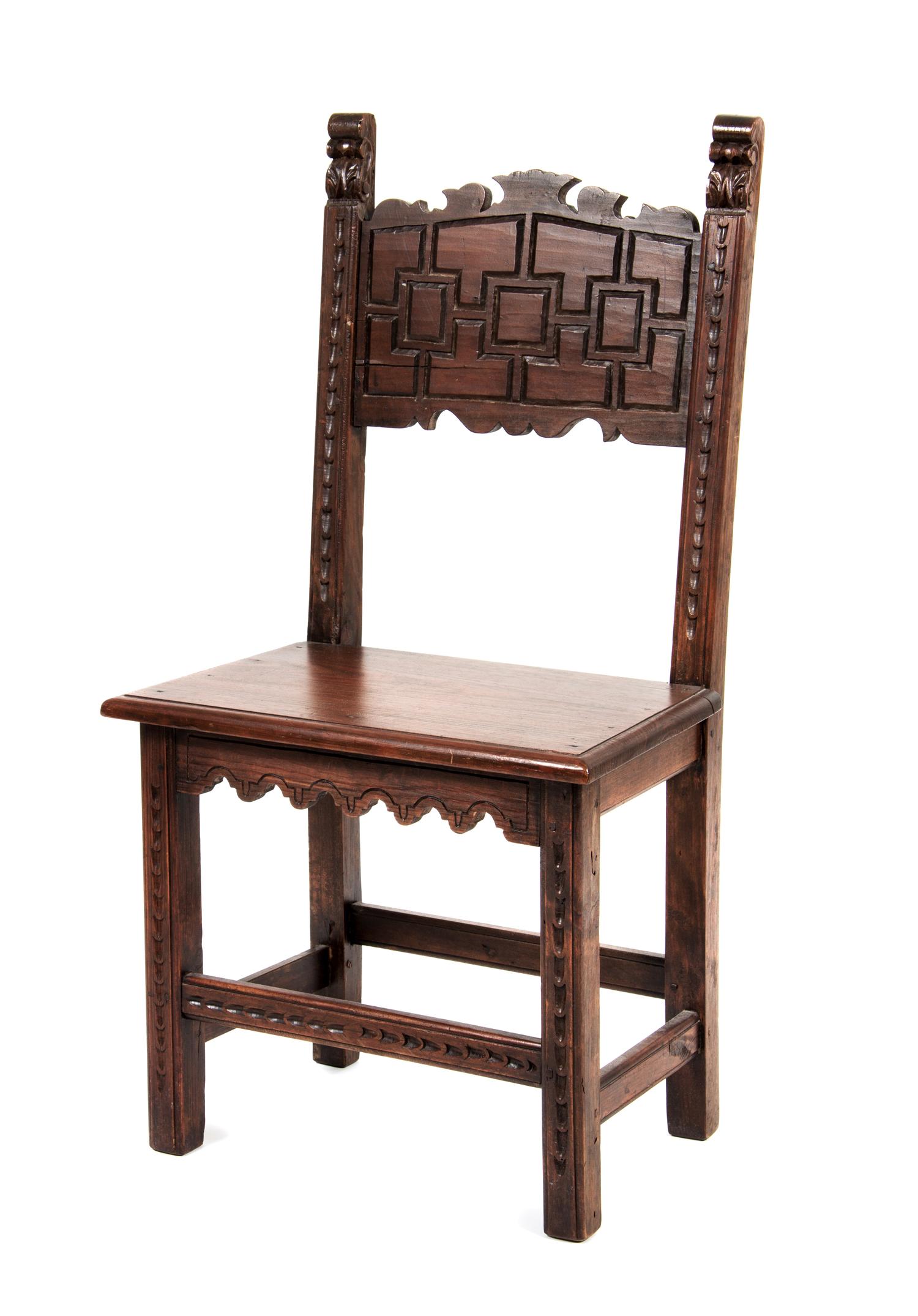 A Jacobean Style Walnut Hall Chair Height 40 1/4 inches.