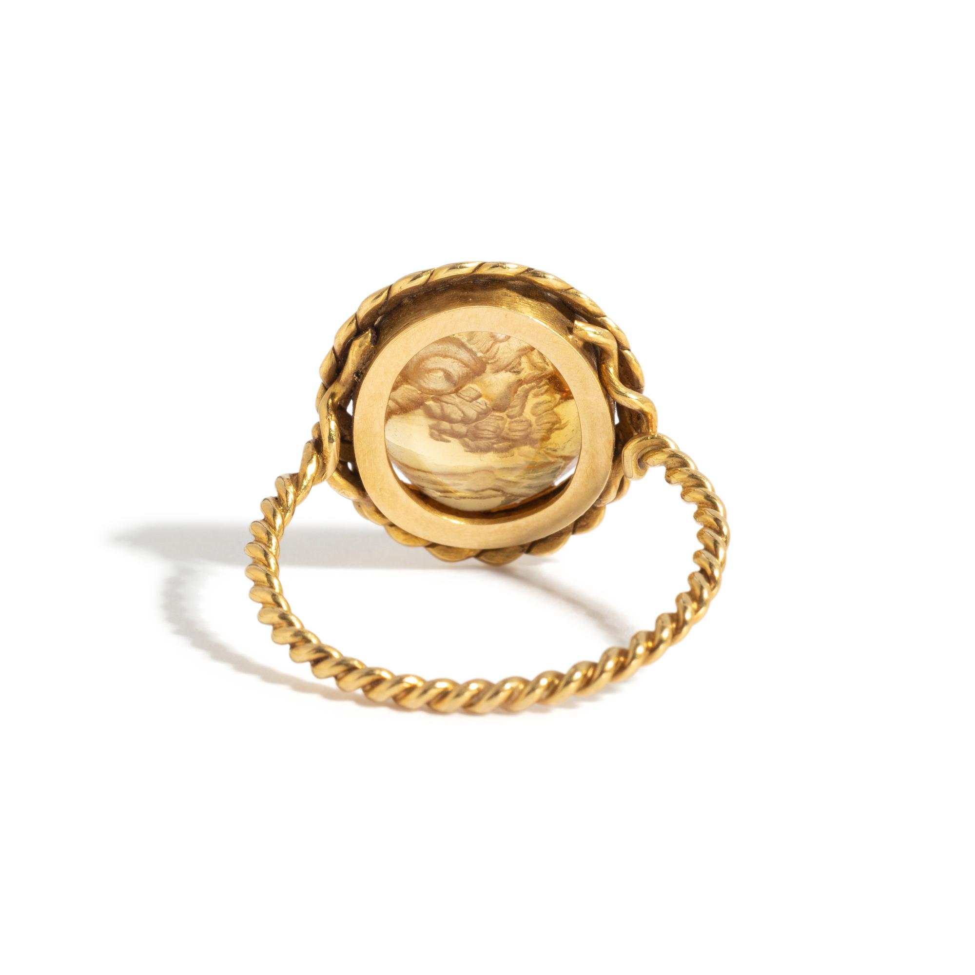 A Neoclassical Gold and Citrine Finger Ring with a Double Bust of Jupiter-Ammon and Juno-Isis