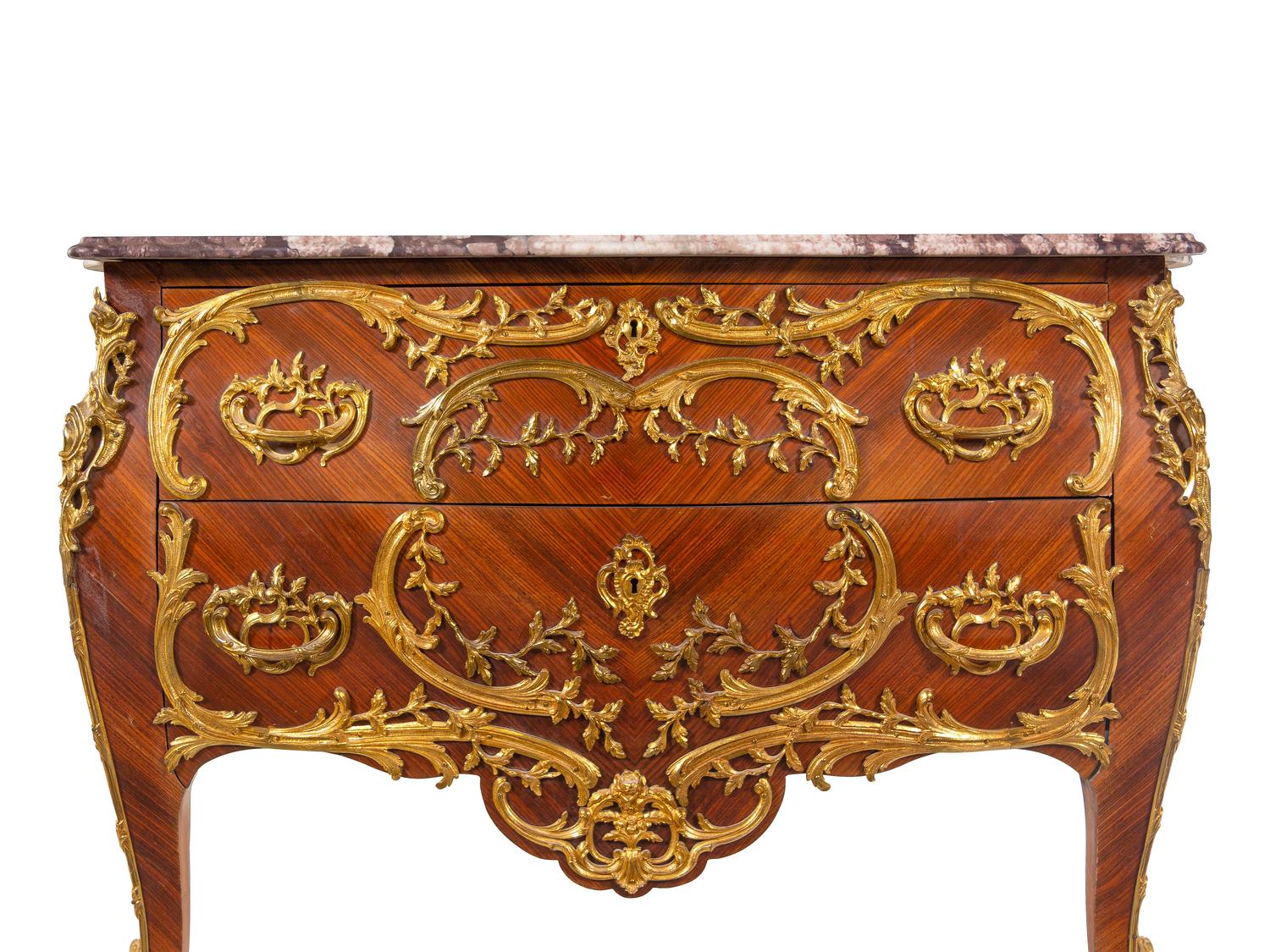 A Louis XV Style Gilt Metal Mounted Kingwood Marble-Top Bombé Commode
