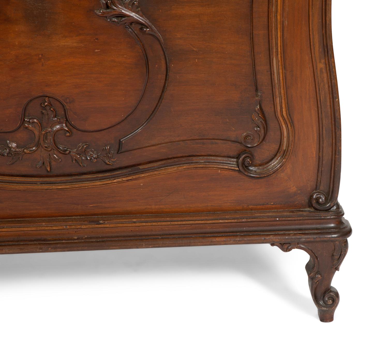 A Pair of American Victorian Carved Mahogany Twin Beds