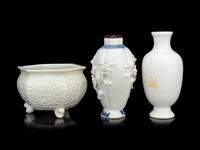 Two Chinese Blanc-de-Chine Porcelain Vases and A Tripod Incense Burner