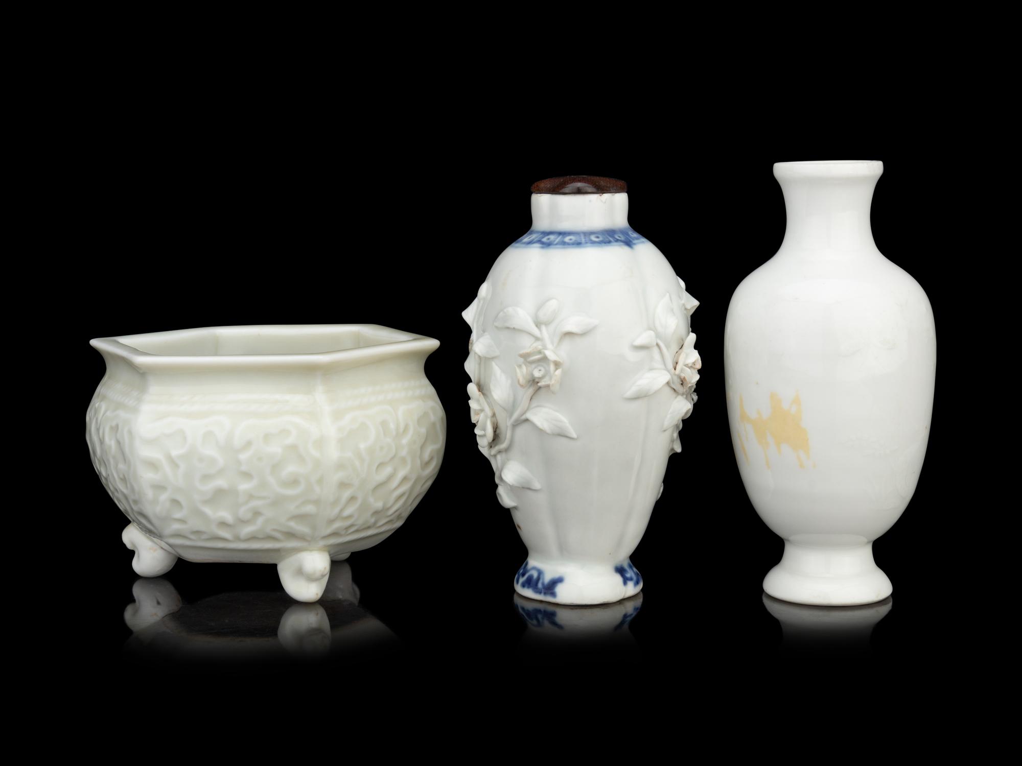 Two Chinese Blanc-de-Chine Porcelain Vases and A Tripod Incense Burner