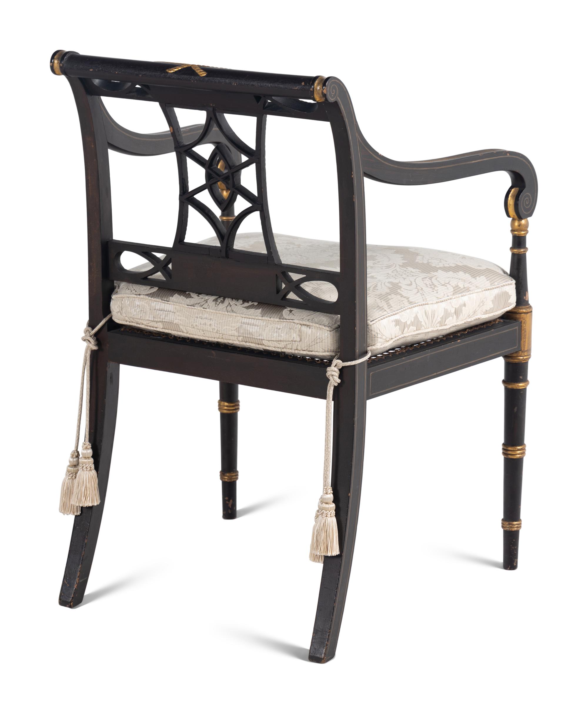A Set of Ten Regency Black and Gilt Japanned Armchairs