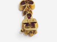 A Pair of Yellow Gold and Gemstone Bracelets