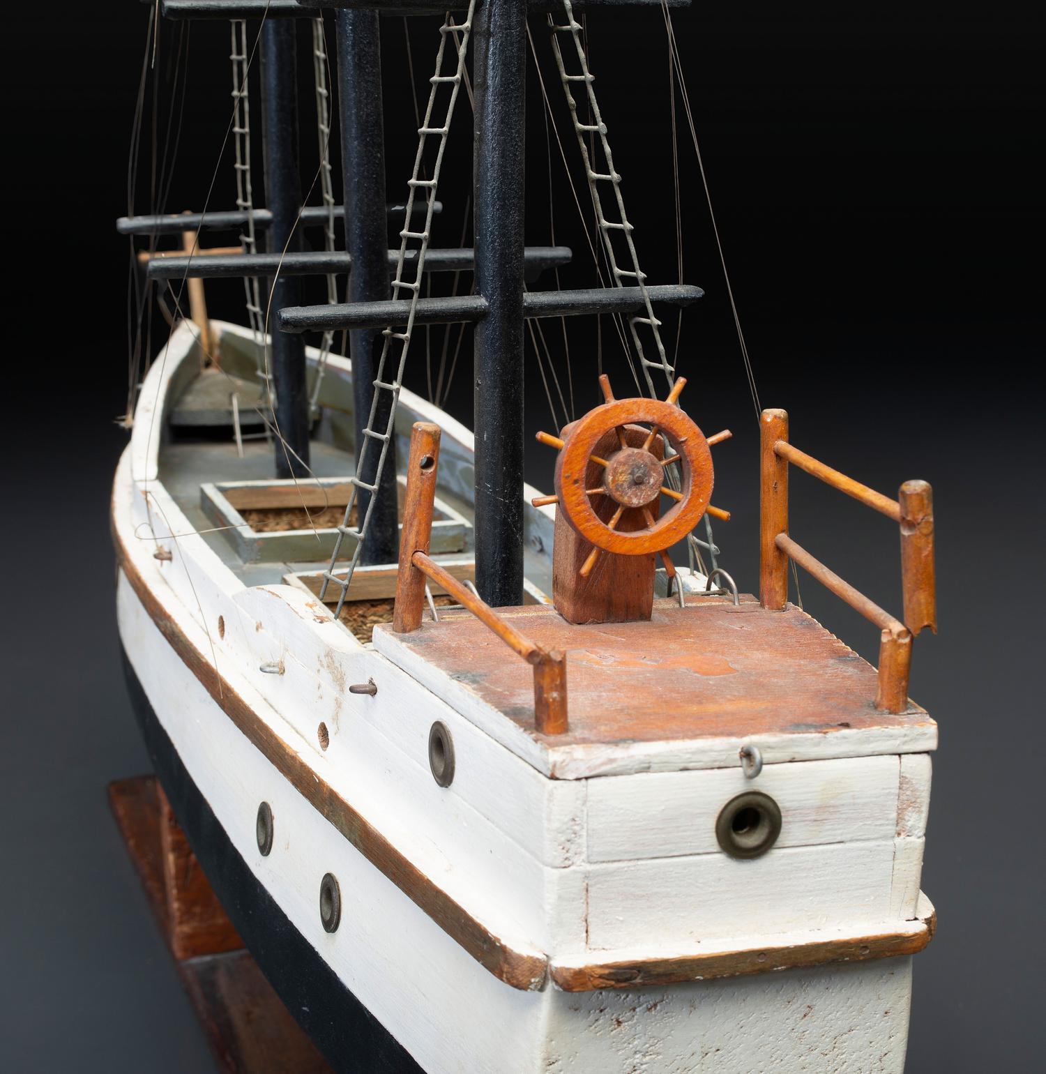 A Carved and Painted Wood Three-Masted Ship Model
