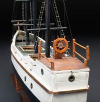 A Carved and Painted Wood Three-Masted Ship Model