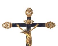 An Italian gilt bronze and ebonized wood crucifix, Naples, 17th century