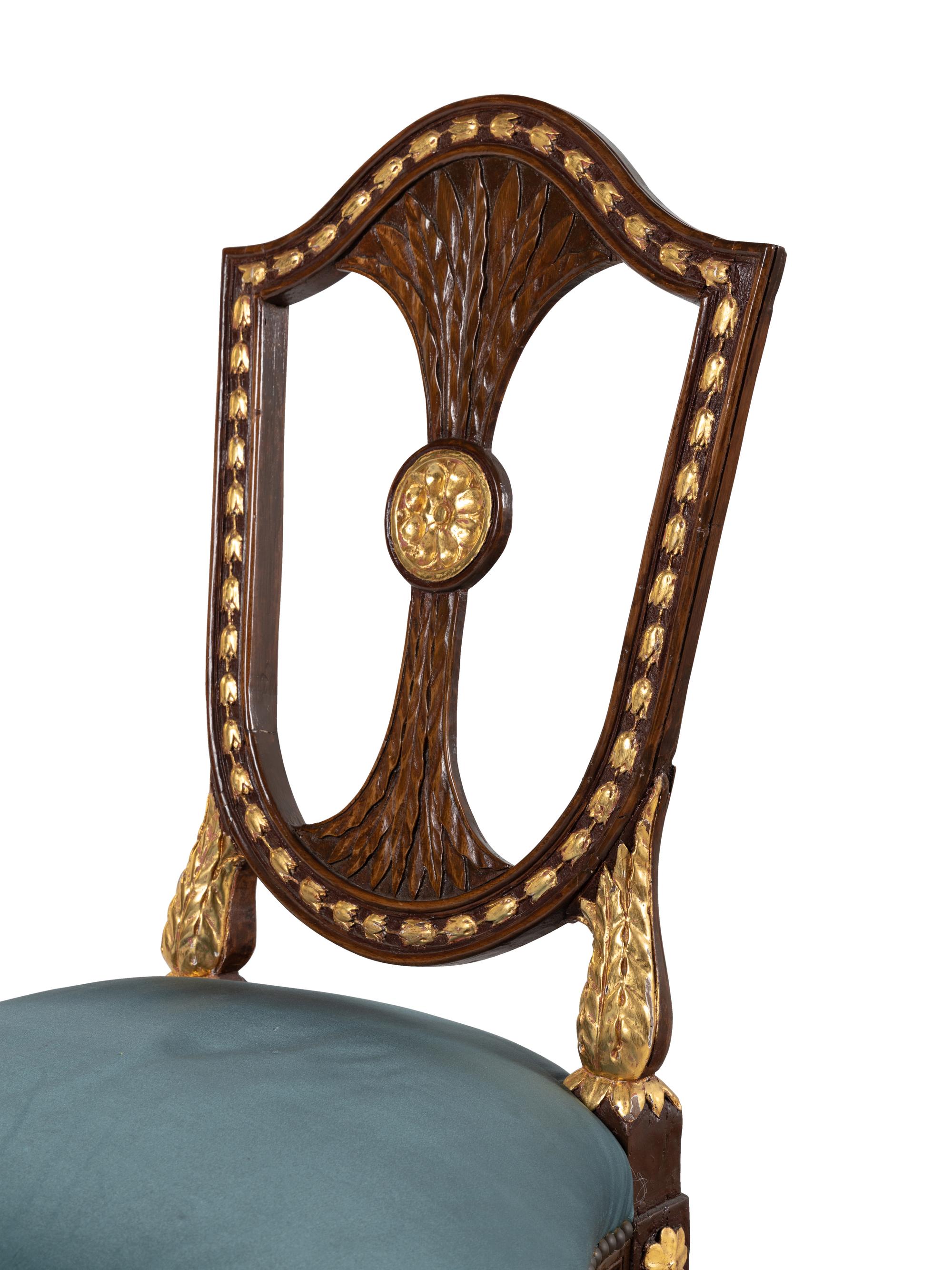 A Pair of Russian Neoclassical Parcel-Gilt Mahogany Side Chairs