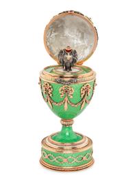 A Gold, Guilloché Enamel and Gemstone-Mounted Surprise Egg