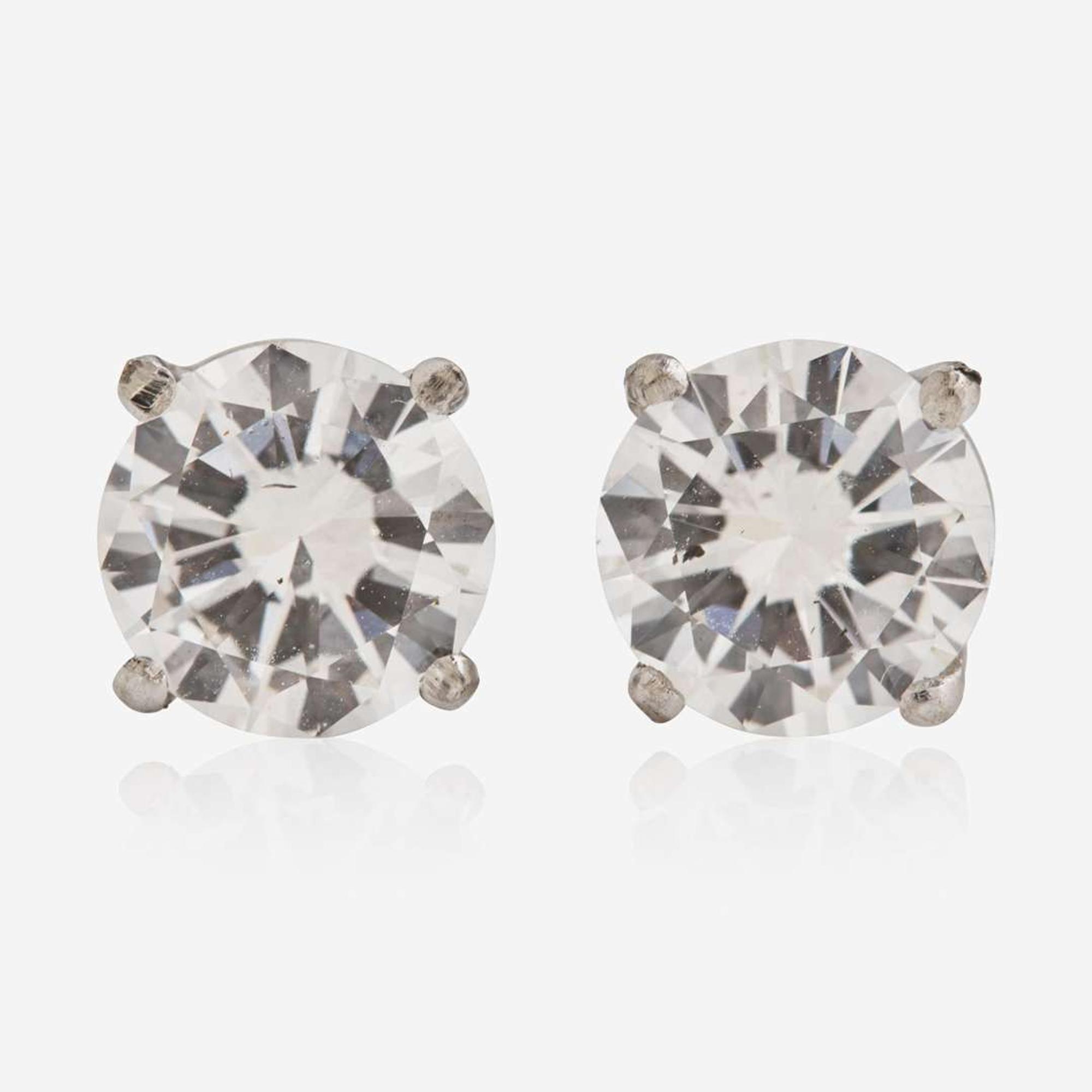 A Pair of 14K White Gold and Diamond Studs 1.18 Carat & 1.19 Carat Round Brilliant-Cut Diamonds, GIA Certified