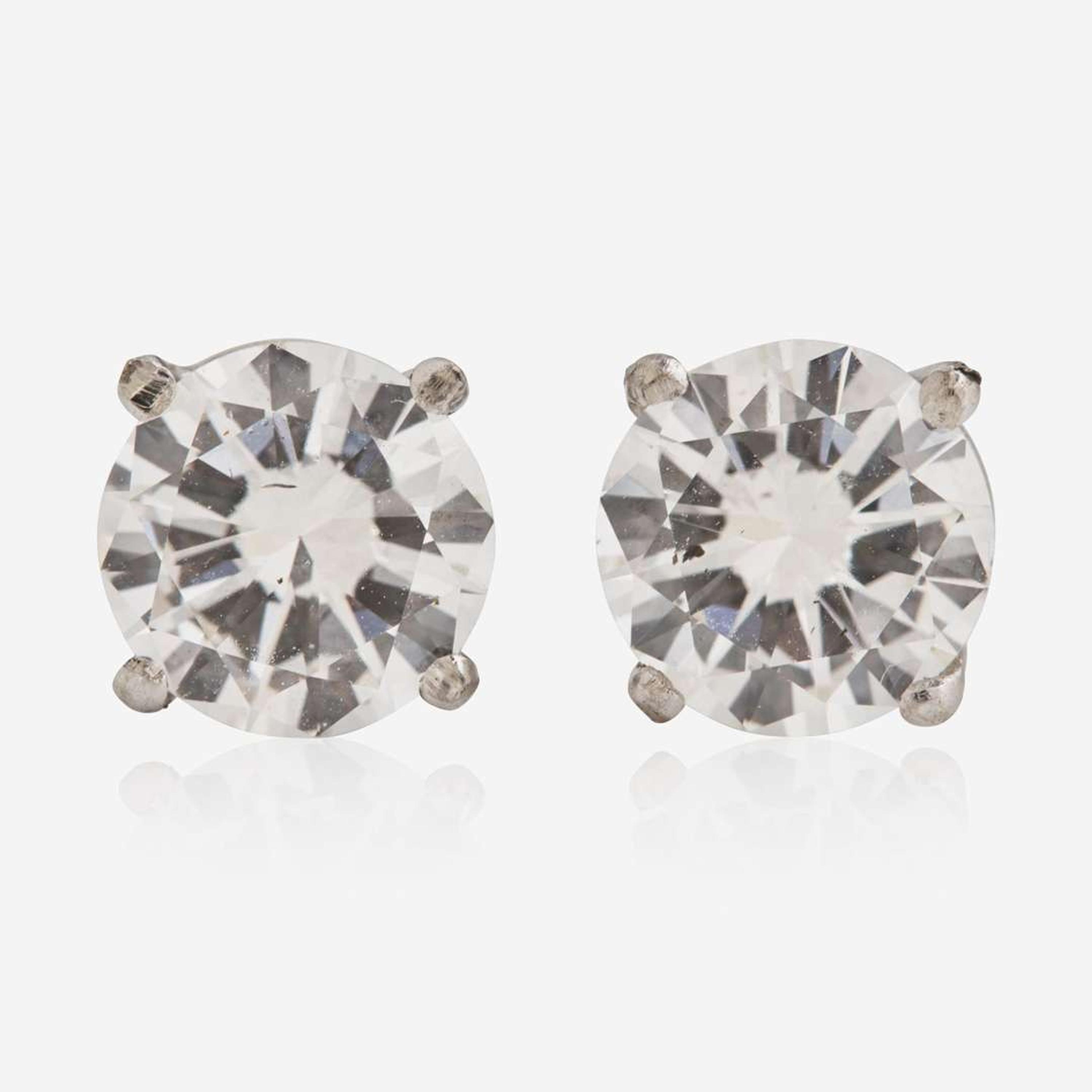 A Pair of 14K White Gold and Diamond Studs 1.18 Carat & 1.19 Carat Round Brilliant-Cut Diamonds, GIA Certified