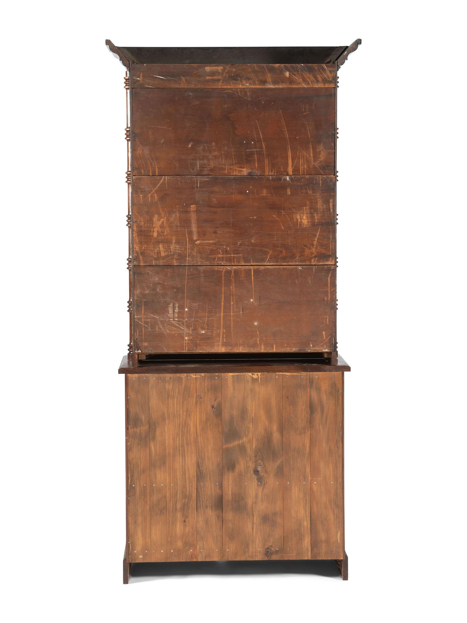 An Oak Stepback Barbershop Cabinet