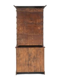 An Oak Stepback Barbershop Cabinet