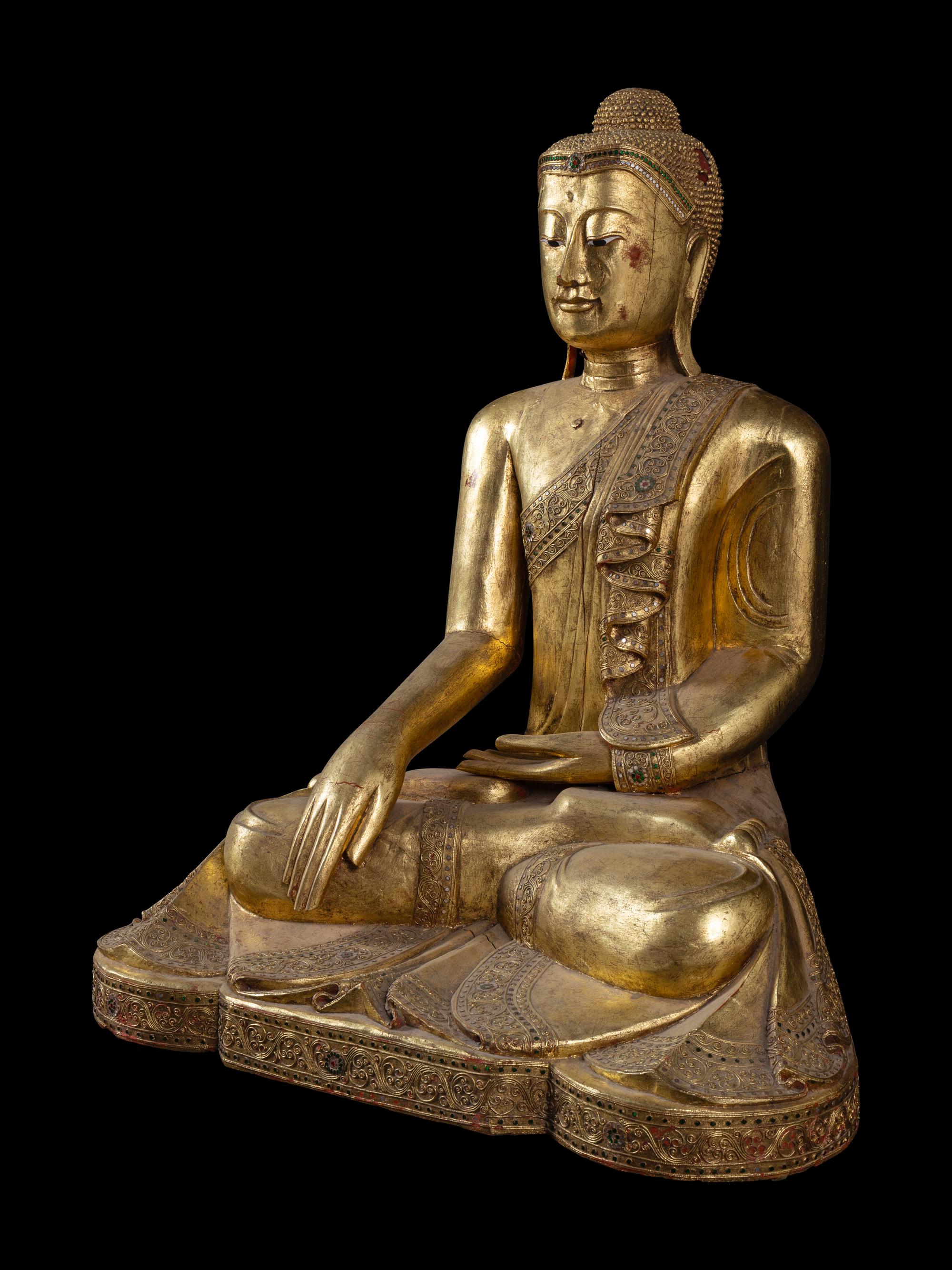 A Large Burmese Gilt Lacquered Figure of Buddha