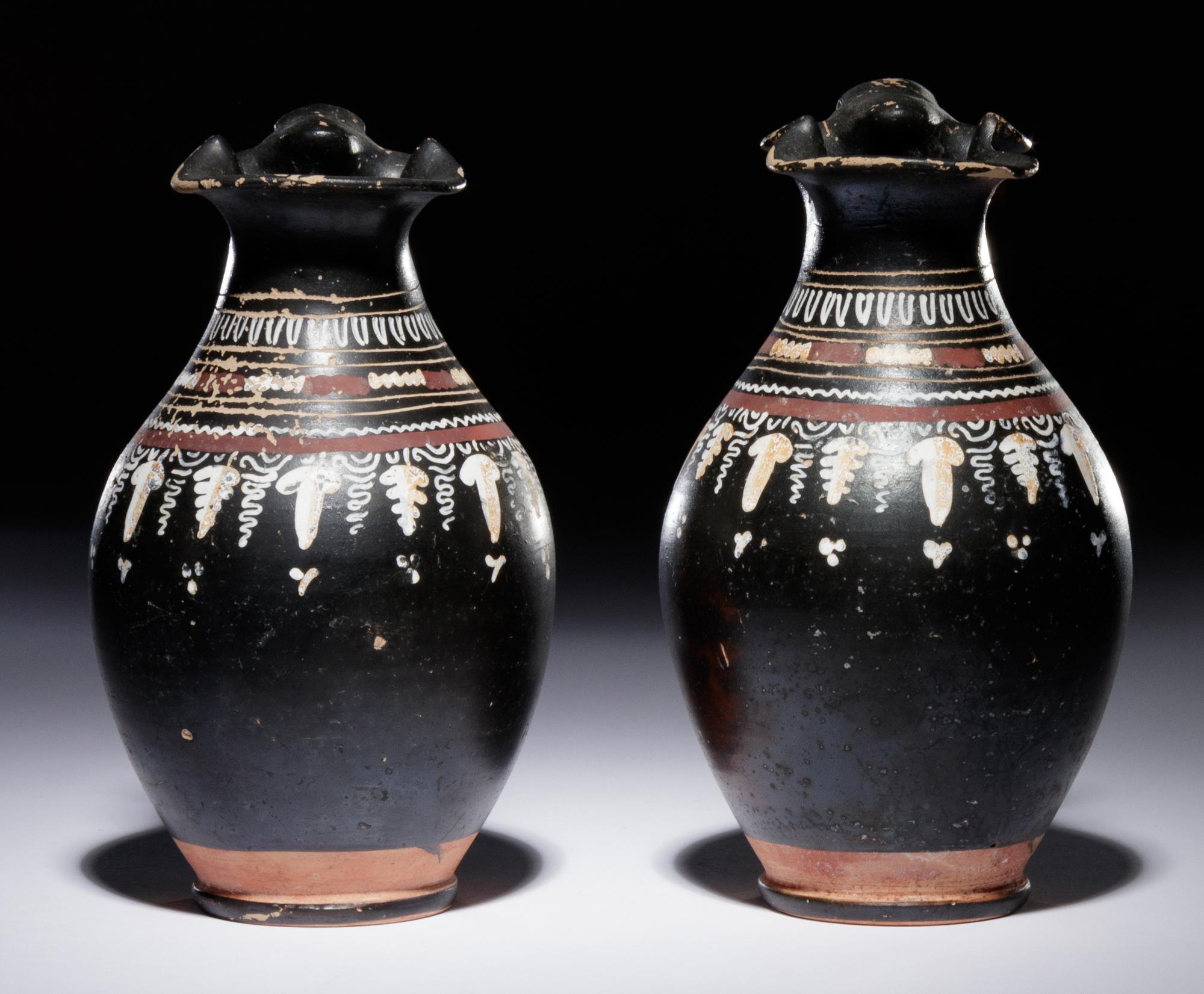 A Pair of Apulian Gnathian Ware Trefoil Oinochoai