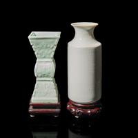 Two Chinese Monochrome Porcelain Vases, 19th Century 晚清 白釉直筒瓶及豆青釉模印雙龍戲珠紋觚各一
