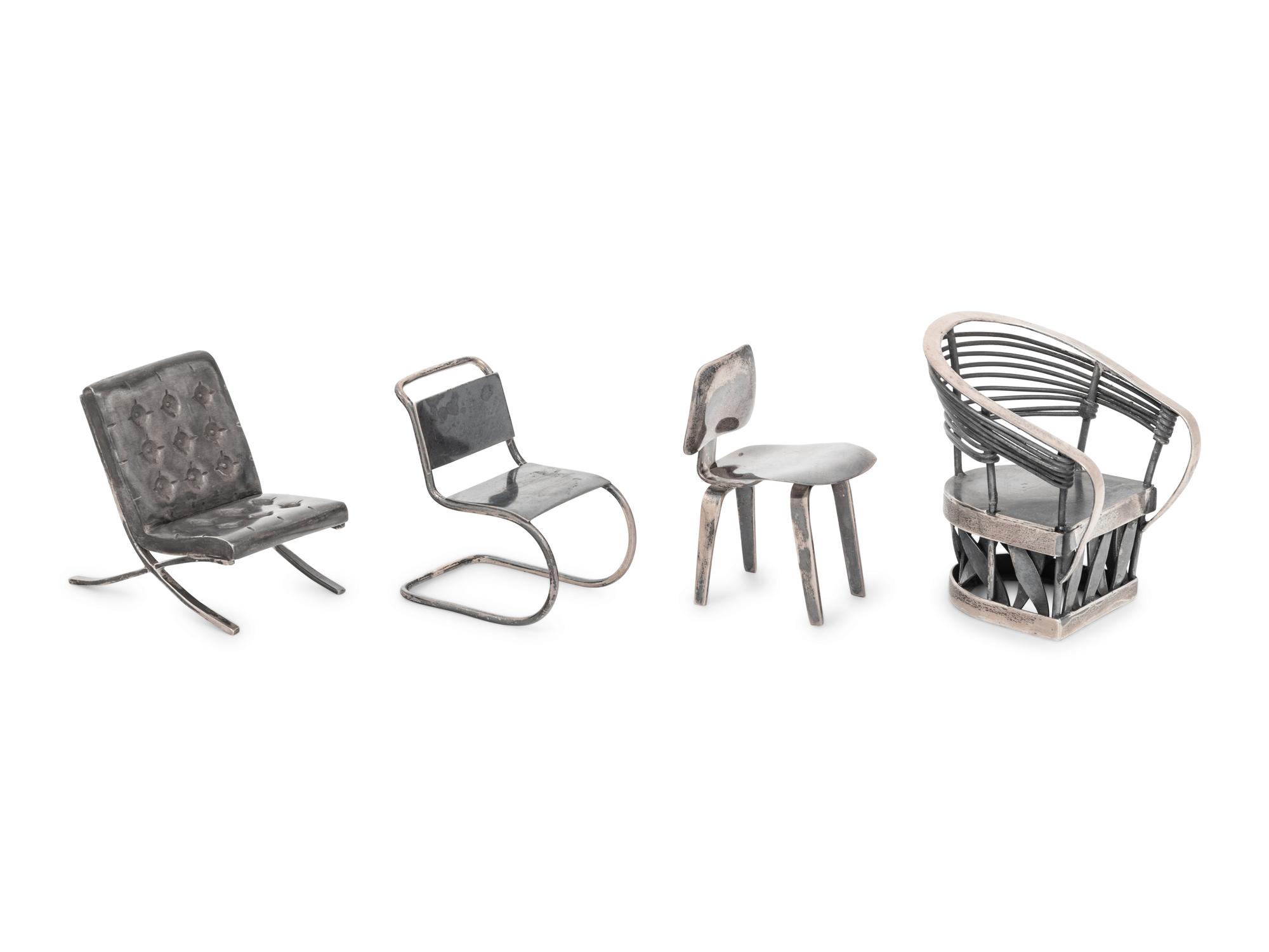 A Set of Three Silver Miniature Modernist Chairs
