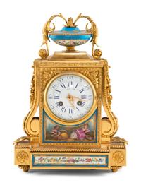 A French Gilt Bronze and Sèvres Style Porcelain Clock