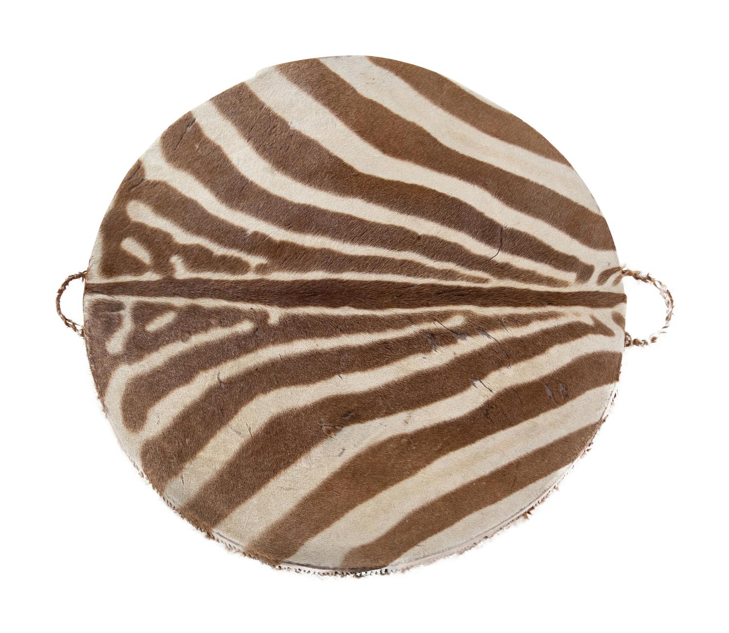 A Taxidermy Zebra Hide and Zebra Leg Table