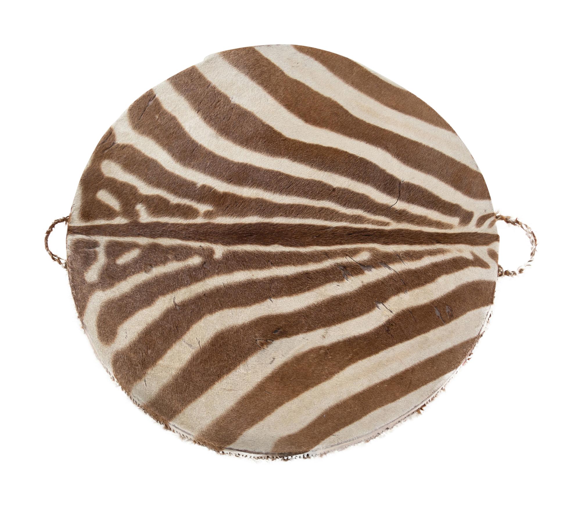 A Taxidermy Zebra Hide and Zebra Leg Table