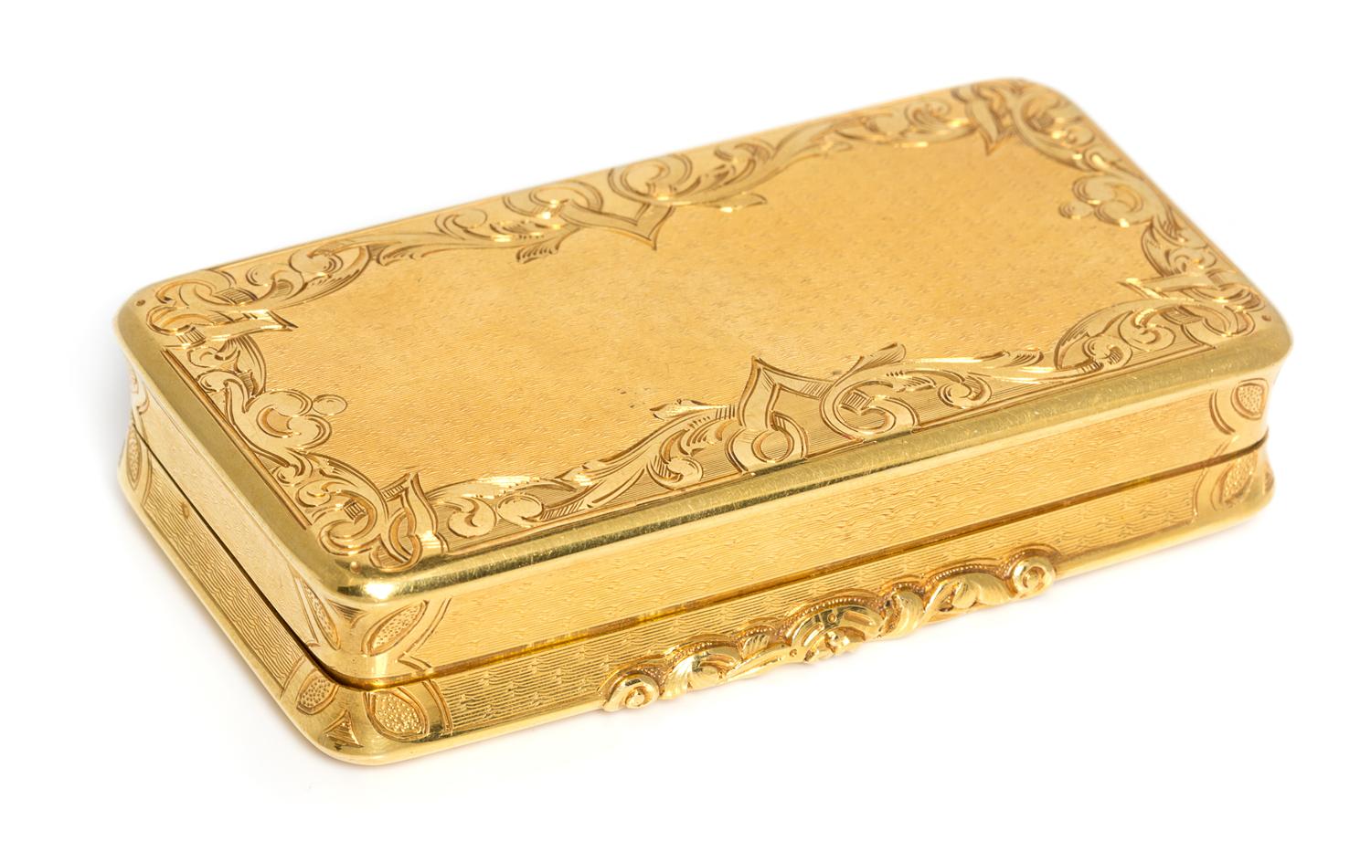 A French 18 Karat Gold Snuff Box, Possibly Louis Tassin, Paris, the lid worked with foliate volute and floral elements and centered by