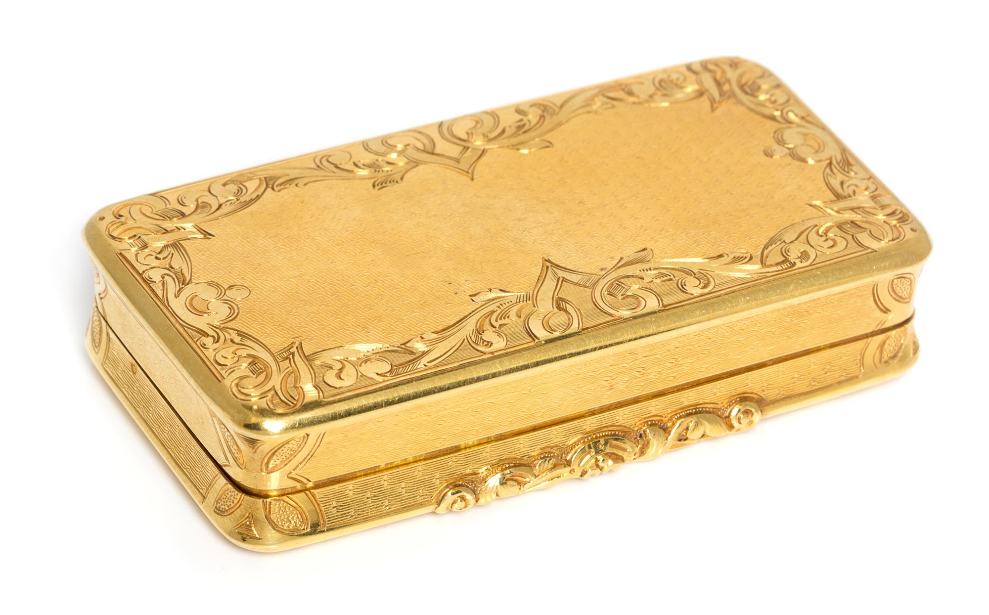 A French 18 Karat Gold Snuff Box, Possibly Louis Tassin, Paris, the lid worked with foliate volute and floral elements and centered by