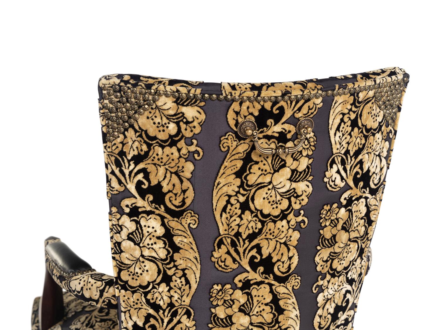 A Set of Four Upholstered Armchairs